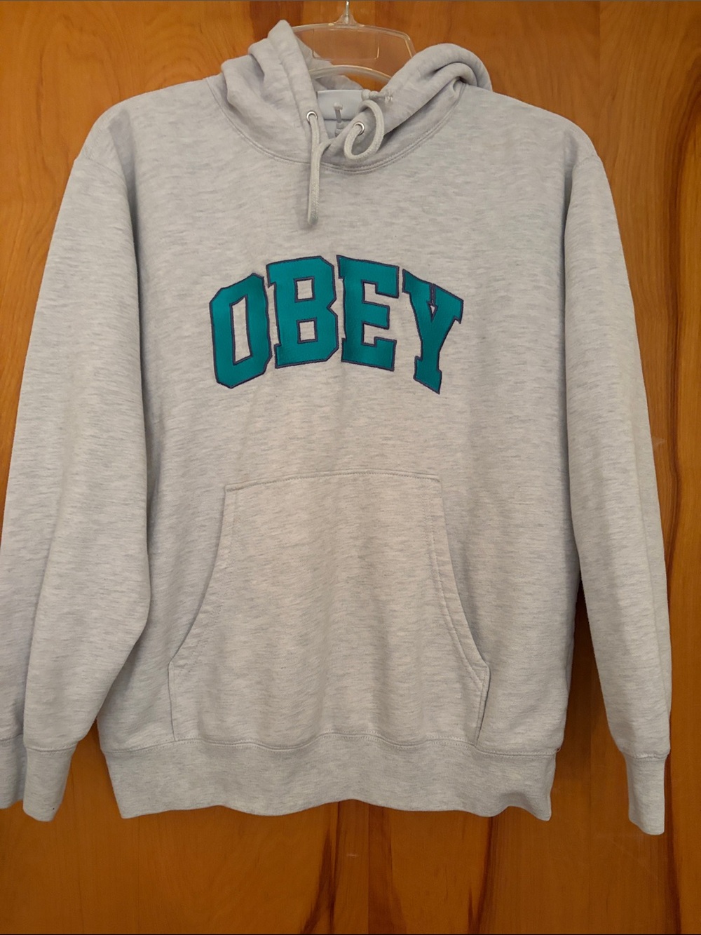 Obey Light Gray Pullover Hoodie with Teal Logo